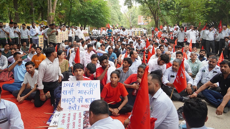 https://www.workersunity.com/wp-content/uploads/2024/07/terminated-maruti-workers-staged-protest.jpg